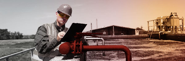 Engineer monitoring a pipeline